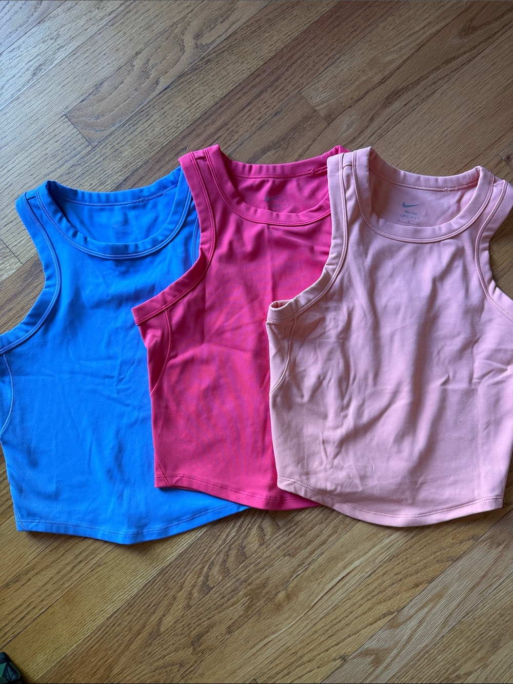 Nike Dri fit Sleeveless Tanks in Periwinkle, Hot Pink & Light Peach